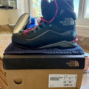 The North Face Black Hiking Boots with Red and Teal Accents